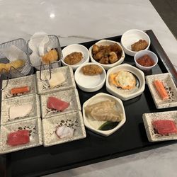 Tokyo Grill Sushi & Hibachi Buffet - Huge selection off small plates and appetizers. This photo doesn't even represent 25% of the offering.