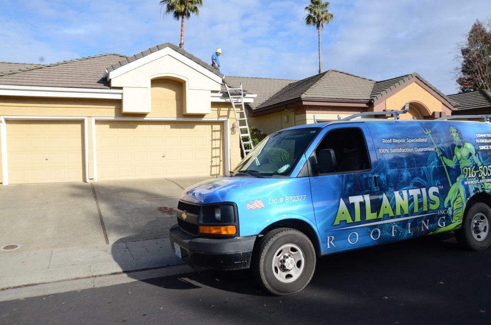 Slide of Atlantis Roofing