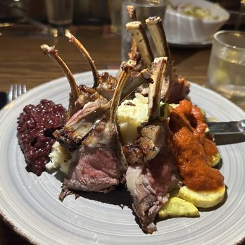 Arts Bar & Grill - Rack of lamb with berry sauce, mashed potatoes and vegetables. - Sports Bars Near Me - Riverside, California Arts Bar & Grill - Rack of lamb with berry sauce, mashed potatoes and vegetables. - Sports Bars Near Me - Riverside, California