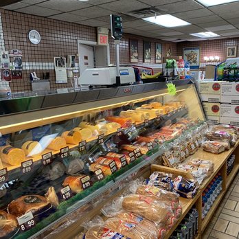 Michael's Wine Shoppe - a display of cheeses and breads - Beer, Wine & Spirits Near Me - Clawson, Michigan