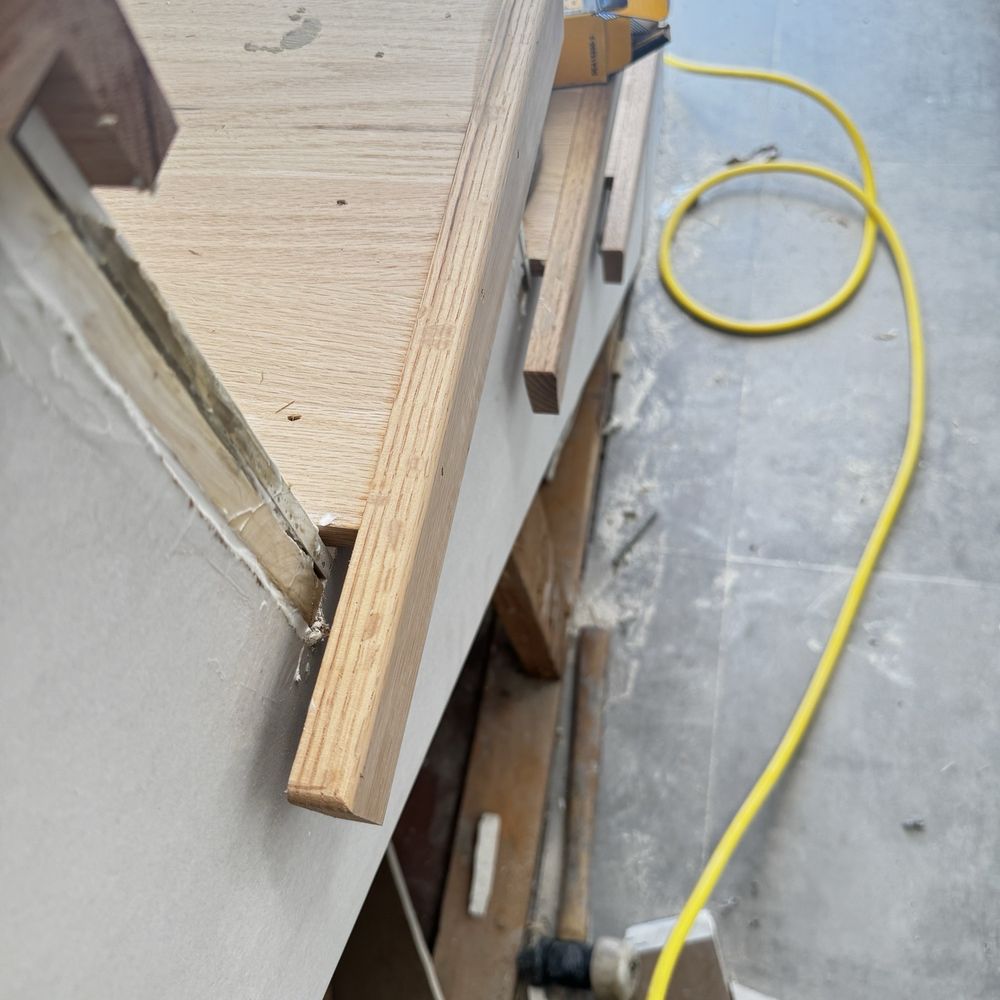 Zurdo Flooring - Also 1inch shims were placed behind risers causing uneven stairs and gaps due to inconsistent cuts - Flooring Near Me Zurdo Flooring - Also 1inch shims were placed behind risers causing uneven stairs and gaps due to inconsistent cuts - Flooring Near Me