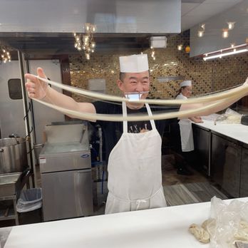 Noodles & Dumplings - Noodle maker in action. - Chinese Near Me - Tyler, Texas Noodles & Dumplings - Noodle maker in action. - Chinese Near Me - Tyler, Texas