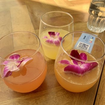 Deck. - Guava, pineapple, passion orange Mimosa - Hawaiian Near Me - Honolulu, Hawaii