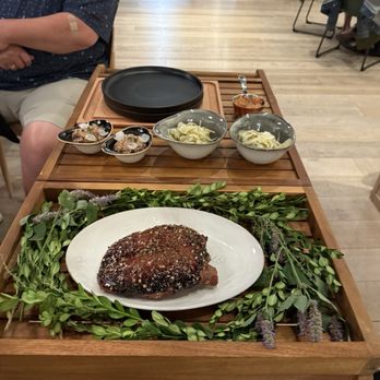 The Elm - Whole roasted dry aged duck breast carved table side with duck confit, pickled mustard seed, pearl onions and fennel slaw! - New American Near Me - Bloomington, Indiana