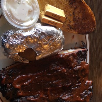 Chris' & Pitt's - Spare Ribs with baked potato and signature garlic bread - Barbeque Near Me - Bellflower, California Chris' & Pitt's - Spare Ribs with baked potato and signature garlic bread - Barbeque Near Me - Bellflower, California
