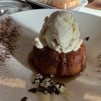 L'Olivo Trattoria - Butterscotch bunt cake with vanilla gelato and butterscotch sauce. Yummy! - Italian Near Me - Exton, Pennsylvania