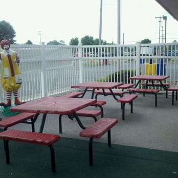 McDonald's - a red picnic table with a clown statue in the background - Coffee & Tea Near Me - Waterloo, New York