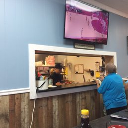 a man ordering food a man ordering food