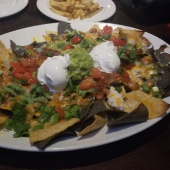 Yard House - Chicken Nachos - New American Near Me - Atlanta, Georgia Yard House - Chicken Nachos - New American Near Me - Atlanta, Georgia