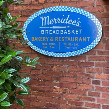 Merridee's Breadbasket - a blue sign on a brick wall - Bakeries Near Me - Franklin, Tennessee