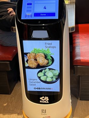 Kura Revolving Sushi Bar by null