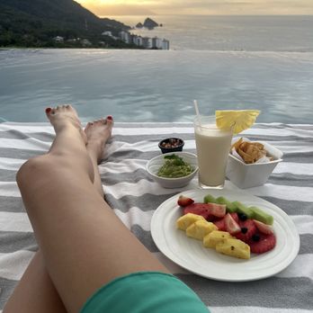 Hotel Mousai - South Tower Rooftop Bar Service: Piña colada, fruit platter, chips and guac, salsa - Hotels Near Me - Puerto Vallarta, JAL