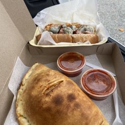 Pepperoni Calzone and Meatball Sun with Sausage. Wife says biggest calzone she's ever had.
