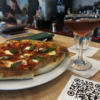 Tavola Trattoria - Digging, honey, Manhattan, and margarita pizza - Italian Near Me - Jacksonville, Florida Tavola Trattoria - Digging, honey, Manhattan, and margarita pizza - Italian Near Me - Jacksonville, Florida
