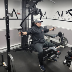 APX Fitness - Machine & Cable Room: multipurpose equipment for full-body strengthening.