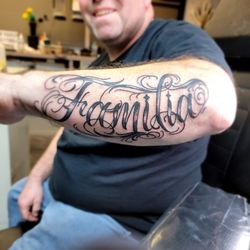 The Ink Vault Tattoo Studio - Familia forearm tattoo by Summer at Ink Vault Tattoo Studio in Clinton Township MI