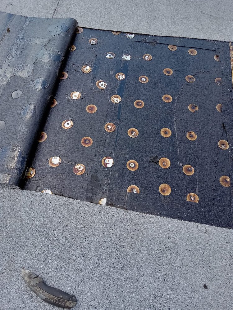 Slide of SGCI Roofing Division