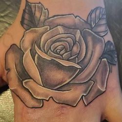 Tatto and Body Piercing - Awesome hand tattoo done by Cassidy