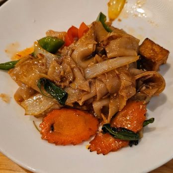 Basil & Co - Drunken noodles with fried tofu and veggie rolls. Delicious and enough kick for my heat sensitive BF. - Thai Near Me - Diamond Bar, California