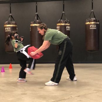 California Defense Academy - Ms. Ericka and my daughter practicing a knee strike. - Fitness & Instruction Near Me - Murrieta, California California Defense Academy - Ms. Ericka and my daughter practicing a knee strike. - Fitness & Instruction Near Me - Murrieta, California