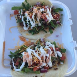 Burger Bus - Ground chuck taco with home made pico de gallo & lime crema. Delicious!!!!!
