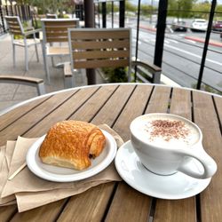 Neighborhood Coffee - Coffee, croissant and panoramic views.