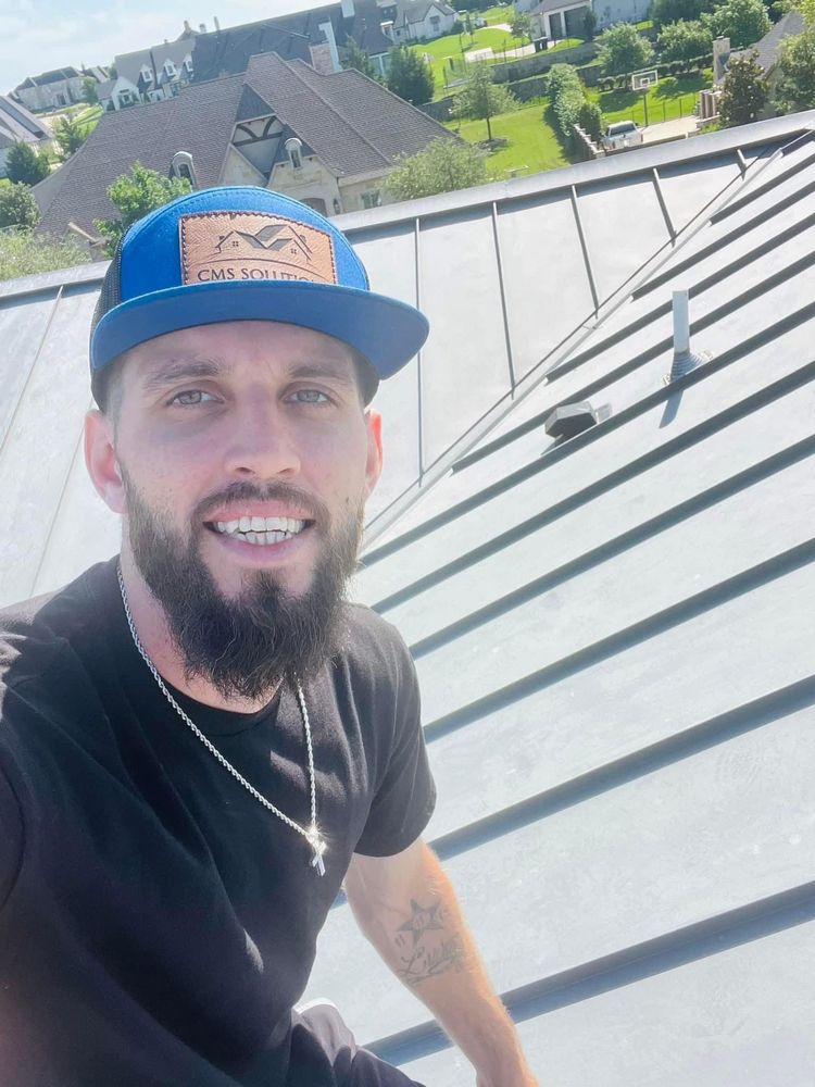 Slide of CMS Roofing