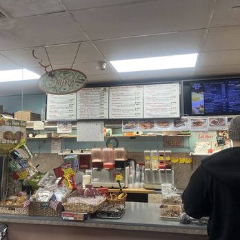 Grace Deli And Bagel - a man at the counter - American Near Me - Bay Shore, New York Grace Deli And Bagel - a man at the counter - American Near Me - Bay Shore, New York