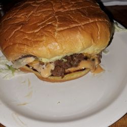 The cheeseburger just like it comes. Pickles, shredded lettuce, super thin pickles, special sauce.