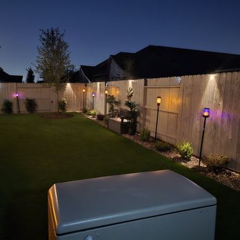 Sanabria Outdoor Solutions - Night time view. Got to reuse our solar lights/bug zappers, front yard shrubs, decorative palms, bench and parrot fence decoration. - Landscaping Near Me - Katy, Texas Sanabria Outdoor Solutions - Night time view. Got to reuse our solar lights/bug zappers, front yard shrubs, decorative palms, bench and parrot fence decoration. - Landscaping Near Me - Katy, Texas