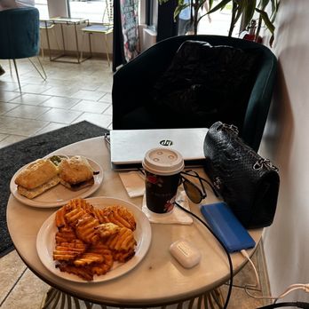 East Rock Coffee - BEC sandwich with very generous side of delicious seasoned waffle fries and a large almond milk Latte - Coffee & Tea Near Me - Island Park, New York East Rock Coffee - BEC sandwich with very generous side of delicious seasoned waffle fries and a large almond milk Latte - Coffee & Tea Near Me - Island Park, New York