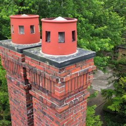 Home Masonry Solutions - Before photo of the old chimney caps