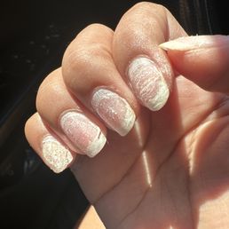 While she was trying to remove my acrylic with the cuticle nipper she cut my actually natural nails.
