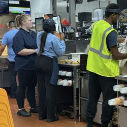 McDonald's - I ordered a 15$ meal and they wouldn't give me a water cup the worker in blue