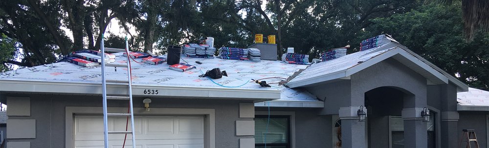 Slide of Waylon's Watertight Roofing