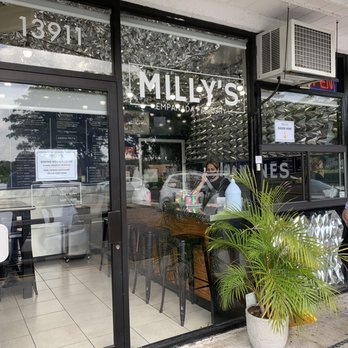 Milly's Empanada Factory - Outside of Milly's Empanada. They have a little window for placing orders. - Venezuelan Near Me - Miami, Florida Milly's Empanada Factory - Outside of Milly's Empanada. They have a little window for placing orders. - Venezuelan Near Me - Miami, Florida