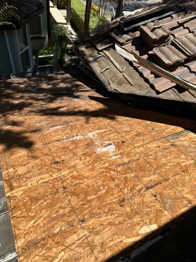 Slide of Aguilar Roofing