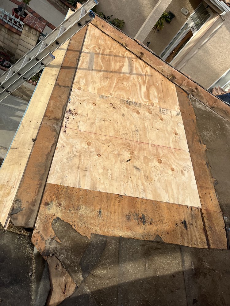 Slide of Prestige Roofing Service