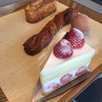 Paris Baguette - From left to right, garlic sweet potato pastry, chocolate pastry, rice ball donut, sweet cream strawberry cake - Bakeries Near Me - Edison, New Jersey Paris Baguette - From left to right, garlic sweet potato pastry, chocolate pastry, rice ball donut, sweet cream strawberry cake - Bakeries Near Me - Edison, New Jersey