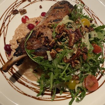 Café la Vie - Pork chop, cranberry pecan risotto, arugula salad - Bars Near Me - St. Louis, Missouri Café la Vie - Pork chop, cranberry pecan risotto, arugula salad - Bars Near Me - St. Louis, Missouri