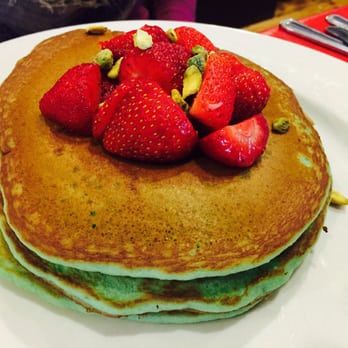 Maureen's Kitchen - Pistachio pancakes with strawberries on top. - Breakfast & Brunch Near Me - Smithtown, New York