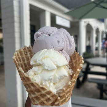 Clare’s Creamery - Honey lavender (top) and lemon (bottom) in a waffle cone - Ice Cream & Frozen Yogurt Near Me - Greenville, South Carolina Clare’s Creamery - Honey lavender (top) and lemon (bottom) in a waffle cone - Ice Cream & Frozen Yogurt Near Me - Greenville, South Carolina