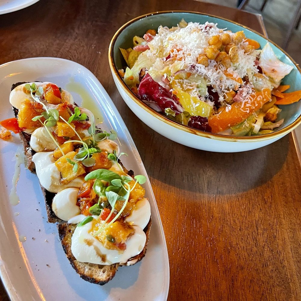 Petula's - Whipped ricotta toast and chopped salad - Cocktail Bars Near Me - South Boston, Massachusetts Petula's - Whipped ricotta toast and chopped salad - Cocktail Bars Near Me - South Boston, Massachusetts