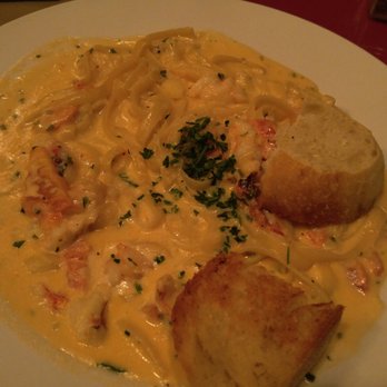 River's Edge Restaurant - Seafood fettuccine--super delicious and quite Creamy. With a side of garlic bread. - Steakhouses Near Me - Grants Pass, Oregon