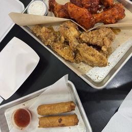 12 pc BONE-IN garlic parm and ninja kick. Super crunchy and cooked well. Pork ER were awesome too. 12 pc BONE-IN garlic parm and ninja kick. Super crunchy and cooked well. Pork ER were awesome too.
