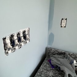 Garrett And Son’s Construction - Touched up with wrong paint and no cover but bathroom is done