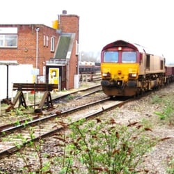 Westbury Railway Station - A Class 66 freight loco waits on the loop behind the old platform 1, with the freight yard in the background.