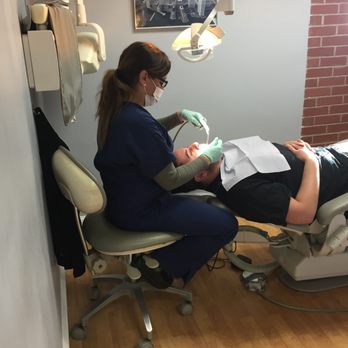 Giangrasso Dental - One of our Tuesday hygienists hard at work. - General Dentistry Near Me - Boston, Massachusetts Giangrasso Dental - One of our Tuesday hygienists hard at work. - General Dentistry Near Me - Boston, Massachusetts