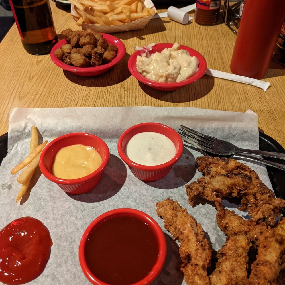Chicken tenders, Mac & cheese, fried okra, fries, chopped brisket sandwich