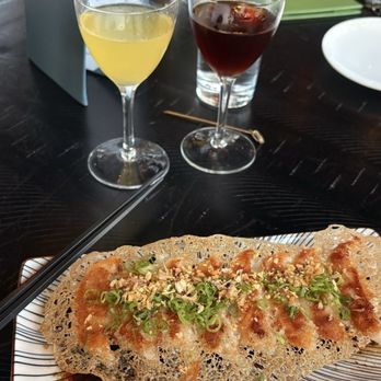 Indo - Chicken and pork gyoza. Cocktails: "Everybody knows your name" (left) and "85 till Midnight" (right) - Pan Asian Near Me - St. Louis, Missouri